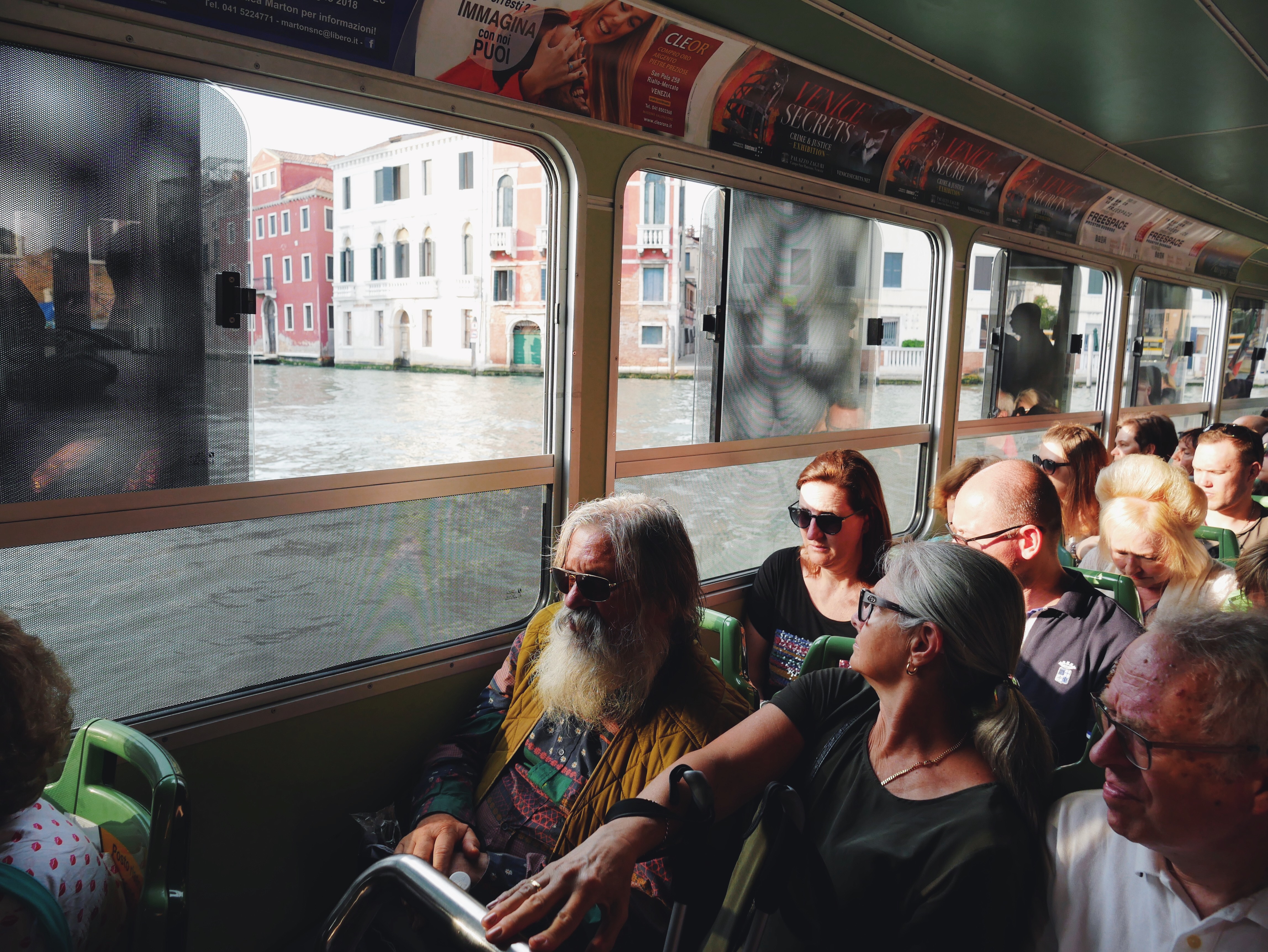 People sitting in the Vaporetto, Carousel Image.